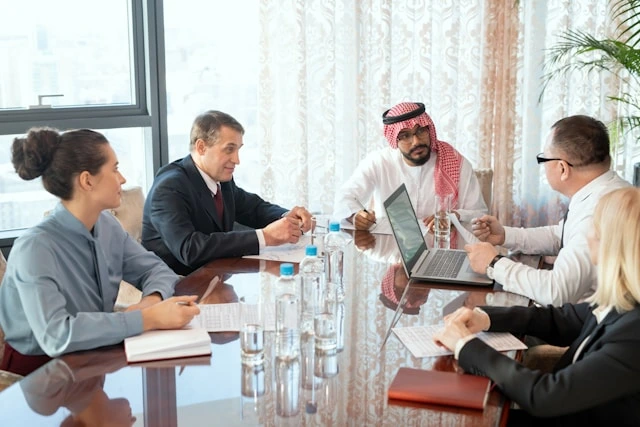 Trade delegates in a negotiation meeting.